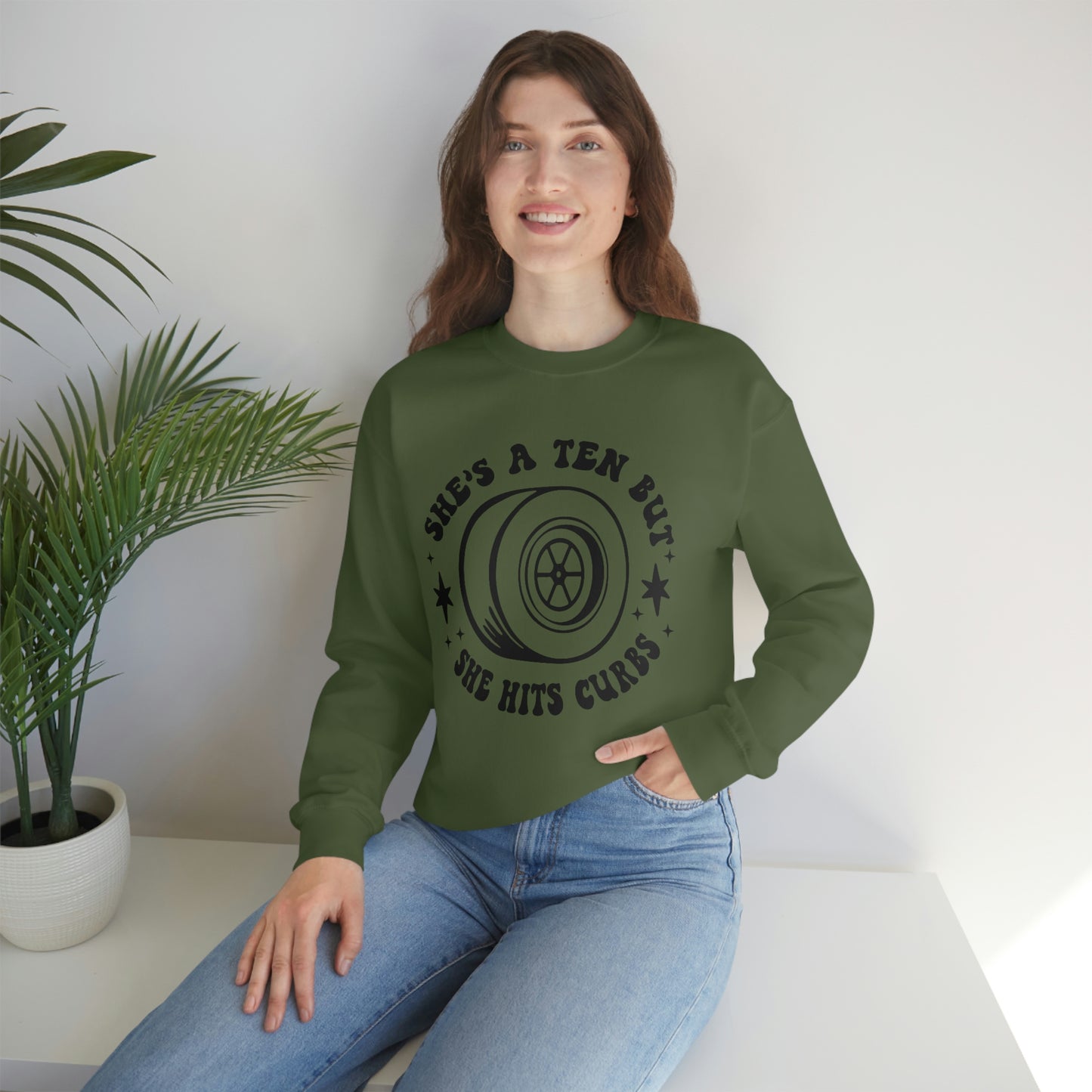 "She's a ten, but she hits curbs" Unisex Heavy Blend™ Crewneck Sweatshirt