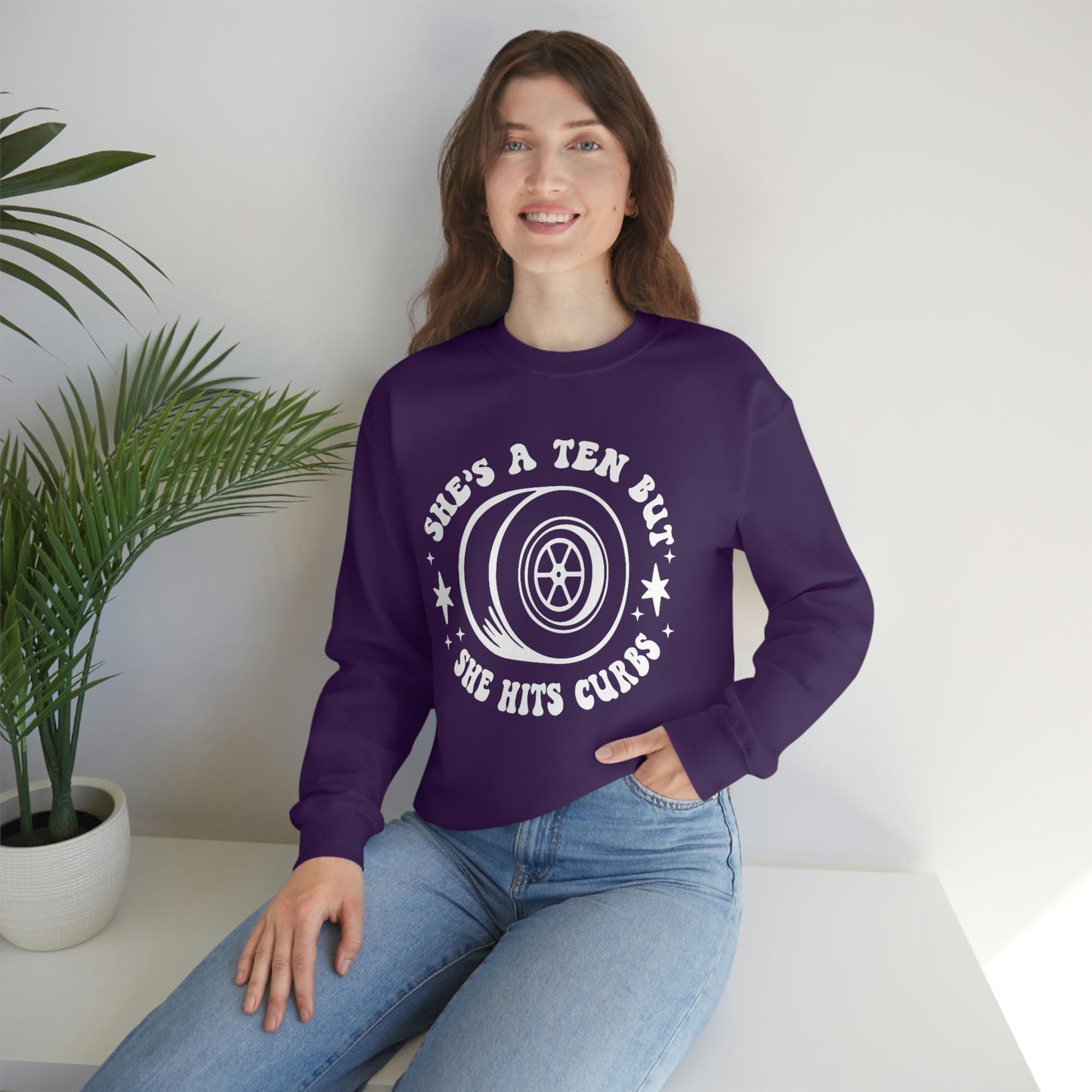 "She's a ten, but she hits curbs" Unisex Heavy Blend™ Crewneck Sweatshirt