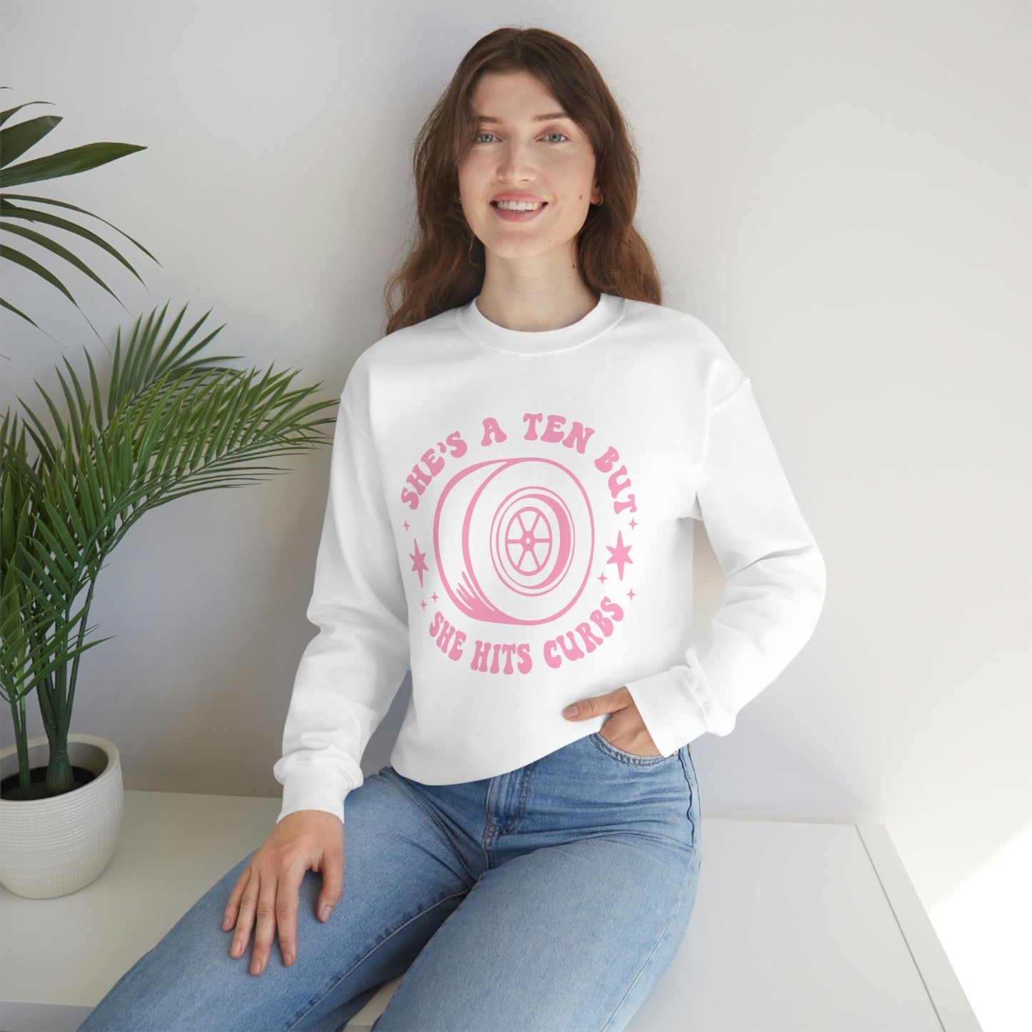 "She's a ten, but she hits curbs" Unisex Heavy Blend™ Crewneck Sweatshirt