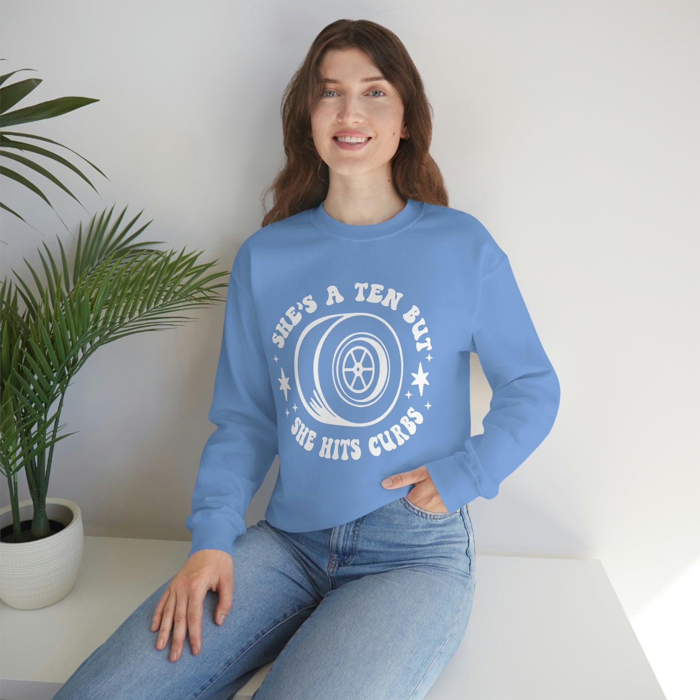 "She's a ten, but she hits curbs" Unisex Heavy Blend™ Crewneck Sweatshirt