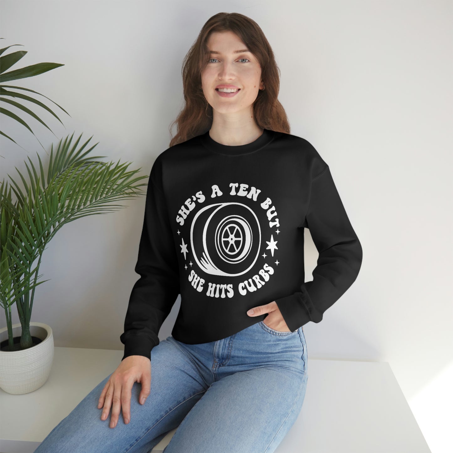 "She's a ten, but she hits curbs" Unisex Heavy Blend™ Crewneck Sweatshirt