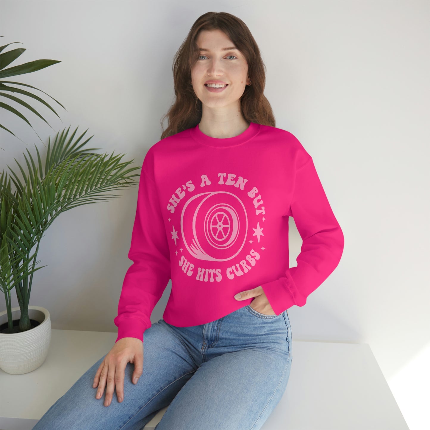 "She's a ten, but she hits curbs" Unisex Heavy Blend™ Crewneck Sweatshirt